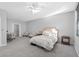 Main bedroom with carpet, walk-in closet and seating area at 226 W Tarrington Dr, Deland, FL 32724