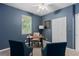 Home office with desk, chairs, and built-in shelving at 226 W Tarrington Dr, Deland, FL 32724