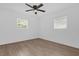 Simple bedroom with hardwood floors and window at 815 N Gary Rd, Lakeland, FL 33801