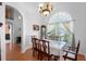 Elegant dining room with a formal table and chandelier at 2289 Jessica Ln, Kissimmee, FL 34744