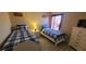 Bedroom with two twin-size beds at 115 Canna Dr, Davenport, FL 33897