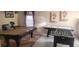 Game room with pool table, foosball, and air hockey at 115 Canna Dr, Davenport, FL 33897