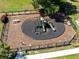 Aerial view of a playground with slides and play equipment, enclosed by a fence at 947 Grandin St, Davenport, FL 33837