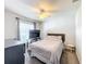 Well-lit bedroom featuring a comfortable bed and TV at 653 Persian Dr, Haines City, FL 33844
