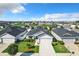 Aerial view of a house with a gray exterior and solar panels at 653 Persian Dr, Haines City, FL 33844
