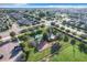 Community playground with play structures and shaded seating at 653 Persian Dr, Haines City, FL 33844