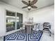 Outdoor patio space with seating and grill at 653 Persian Dr, Haines City, FL 33844