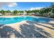 Inviting kidney-shaped community pool with plenty of deck space at 653 Persian Dr, Haines City, FL 33844