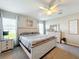 Main bedroom with a rustic-style bed and plenty of natural light at 653 Persian Dr, Haines City, FL 33844