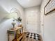 Entryway with console table, mirror, and decorative accents at 653 Persian Dr, Haines City, FL 33844