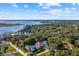 Lakeside home with expansive views and surrounding neighborhood at 830 Oakdale St, Windermere, FL 34786