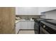 Modern laundry room with front-load washer and dryer at 830 Oakdale St, Windermere, FL 34786