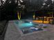 Relaxing pool area with outdoor kitchen and pergola at 830 Oakdale St, Windermere, FL 34786
