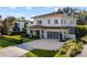 Two-story home with modern design and attached garage at 830 Oakdale St, Windermere, FL 34786