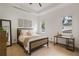 Bright bedroom featuring a comfortable bed and plenty of natural light at 830 Oakdale St, Windermere, FL 34786