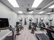 Well-equipped fitness center with various cardio and strength machines at 26721 Racquet Cir, Leesburg, FL 34748