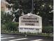 Promenade Condominium Towers building entrance sign at 6312 Buford St # 304, Orlando, FL 32835