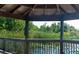 Gazebo with scenic views of the lake and lush greenery at 6312 Buford St # 304, Orlando, FL 32835