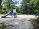 playground with swings and slides at 50 Sheoah Blvd # 34, Winter Springs, FL 32708