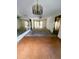 Spacious living room with large windows and patio access at 50 Sheoah Blvd # 34, Winter Springs, FL 32708