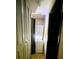 Stackable washer and dryer in a small laundry room with light-colored built-in cabinets at 50 Sheoah Blvd # 34, Winter Springs, FL 32708