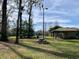 Picnic area with gazebo, grills and tables near a lake at 50 Sheoah Blvd # 34, Winter Springs, FL 32708