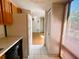 Efficient kitchen with ample cabinet space and access to the dining area at 50 Sheoah Blvd # 34, Winter Springs, FL 32708