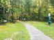 Nature trail with benches and pet waste station at 50 Sheoah Blvd # 34, Winter Springs, FL 32708