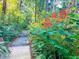 Landscaped nature trail with lush foliage at 50 Sheoah Blvd # 34, Winter Springs, FL 32708