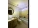 Bathroom with vintage tile and a tub shower combination at 50 Sheoah Blvd # 34, Winter Springs, FL 32708