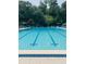 Inviting community swimming pool with plenty of lounge chairs at 50 Sheoah Blvd # 34, Winter Springs, FL 32708