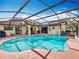 Inviting pool and spa, with covered patio and dining at 8069 N Cadiz Ct, Orlando, FL 32836