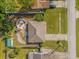 Aerial view of a home with a large inground pool at 3109 Sky St, Deltona, FL 32738