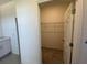 Large walk-in closet offering plenty of storage at 3112 Windswept Way, Wildwood, FL 34785
