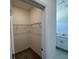 Spacious walk-in closet with ample shelving and hanging space at 3112 Windswept Way, Wildwood, FL 34785