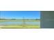 Scenic view of a lake from a house window at 3112 Windswept Way, Wildwood, FL 34785