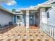 Front porch with tile flooring and seating area at 2632 Muscatello St, Orlando, FL 32837