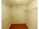 Walk-in closet with wire shelving for ample storage at 8647 Otter Creek Ct, Orlando, FL 32829
