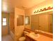 Clean bathroom with a shower/tub combo, toilet and vanity at 8647 Otter Creek Ct, Orlando, FL 32829