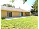 Spacious backyard with patio and grassy area at 8647 Otter Creek Ct, Orlando, FL 32829