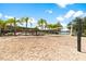 Outdoor sand volleyball court with lake view at 4511 Monado Dr, Kissimmee, FL 34746