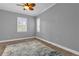 Spacious bedroom with ceiling fan and wood flooring at 6320 S Sylvan Lake Dr, Sanford, FL 32771