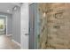 Modern bathroom with a large walk-in shower and tile surround at 6320 S Sylvan Lake Dr, Sanford, FL 32771