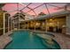 Inviting kidney-shaped pool with a covered patio at 6320 S Sylvan Lake Dr, Sanford, FL 32771