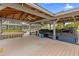 Covered boat dock with a swing and plenty of space for storage at 6320 S Sylvan Lake Dr, Sanford, FL 32771