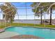 Inviting screened pool with lake view at 6320 S Sylvan Lake Dr, Sanford, FL 32771