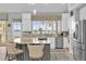 Gourmet kitchen with granite island, stainless steel appliances, and lake views at 6320 S Sylvan Lake Dr, Sanford, FL 32771