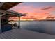 Relaxing boat dock at sunset with beautiful lake views at 6320 S Sylvan Lake Dr, Sanford, FL 32771