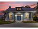 Charming one-story home with a welcoming front porch and double doors at 6320 S Sylvan Lake Dr, Sanford, FL 32771