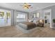 Main bedroom with lake views and a king-size bed at 6320 S Sylvan Lake Dr, Sanford, FL 32771